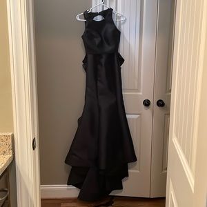 Black rose accented Sherri Hill prom dress